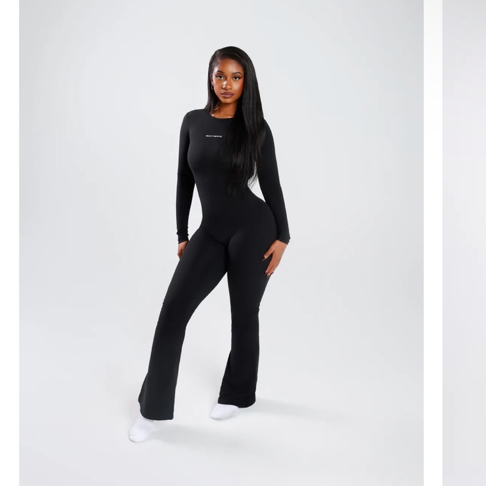 OPEN V BACK FLARE JUMPSUIT new with tags